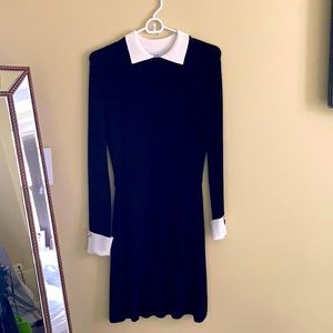A black knit Zara dress with pearl buttons